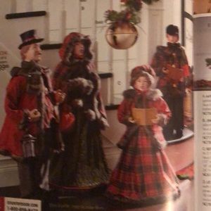 Victorian style 4 carolers man ‘women boy girl